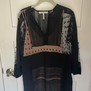 Black shift dress with nude slip